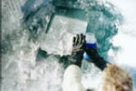 Alan Hildebrand recovering a block of ice containing meteorites.