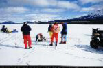 Alan Hildebrand recovering meteorite out of ice.