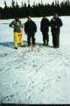 Meteorite team in front of meteorite find (marked with small branch).