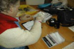 Alan weighing and measuring original meteorite fragments.