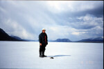 Howard Plotkin on the ice near recovered fragment.